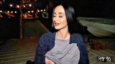 Violet Voss exposing perky tits in open plaid shirt outdoors
