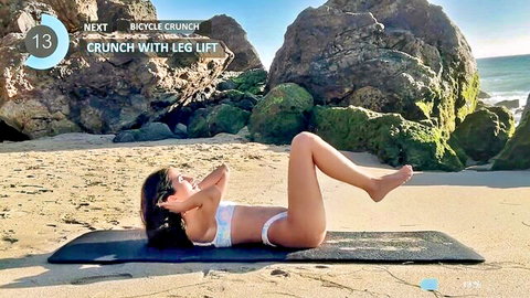 Sahar Babs in white bikini doing leg lift crunch on beach