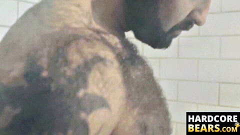 Hairy bear man washes furry body in shower, thick beefy ass spanking