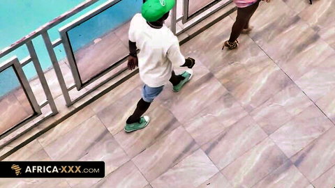 EboBlack African top model poolside tease in green hat and shorts