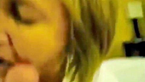 Blonde MILF in yellow top, seductive close-up for mom-son kink