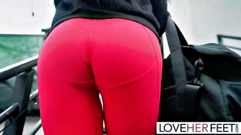 Dean Van Damme's curvy ass in tight red leggings, walking away view