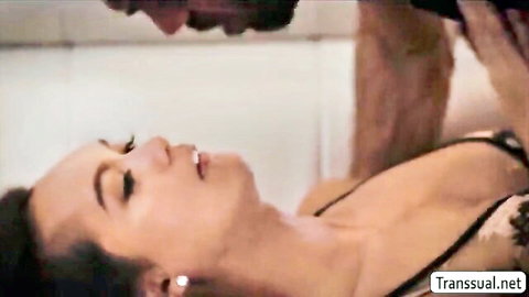 TGirl Andrea Zhay in lingerie giving oral to dark-skinned man