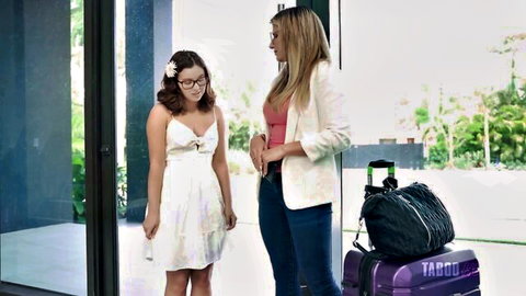 Brunette teen in short white dress talks to blonde MILF stepmom beside taboo suitcase