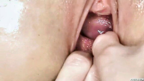 Close-up bimanual fisting with deep loose pussy gaping