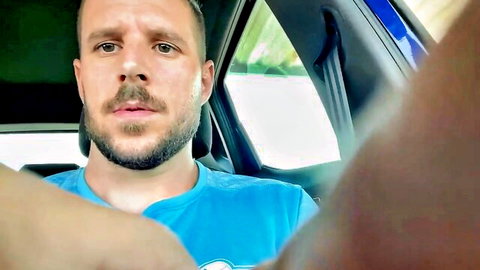 Sexy Spanish dude with beard jerks off in car, hand on crotch