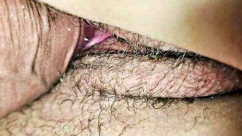Close-up of hairy mature pussy, detailed view of bushy vulva