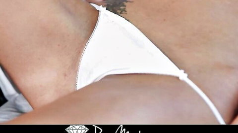 Tattooed babe's shaved mound teased by tiny white thong pulled tight