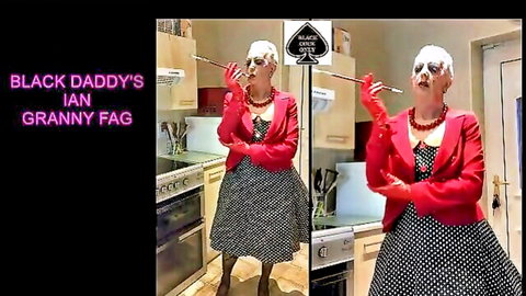 Ebony granny fag in red gloves and polka dot dress posing seductively