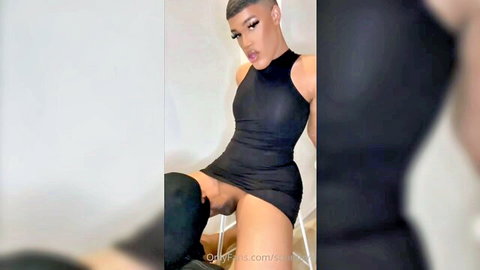 Black femboy in tight black dress spreads legs for intense tease
