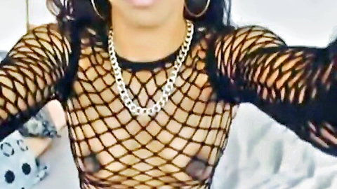 Ebony cam girl in sheer black mesh top exposing nipples seductively