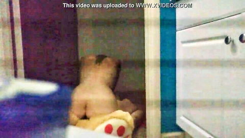 naked woman in a cabinet