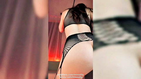 Brunette bends over in sheer black fishnets exposing juicy bare ass cheeks from behind