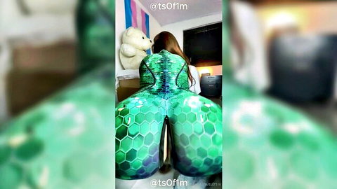TS Bruna's curvy ass in shiny green bodysuit, anal gape tease