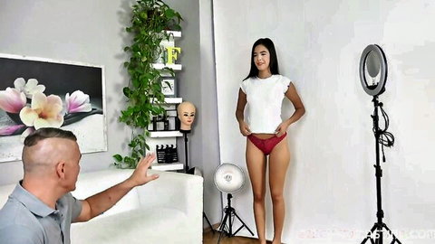 Asian beauty in white crop top and red panties posing for Czech casting