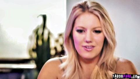 Candice Dare in seductive lingerie pose from threesome scene