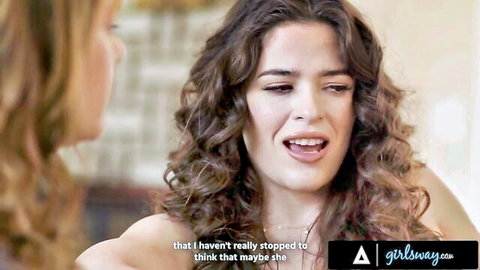 Two curly-haired brunettes in passionate face-to-face talk before lesbian cunnilingus