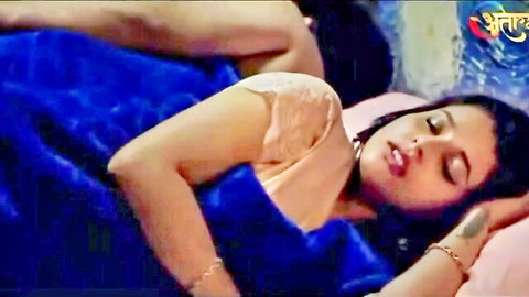 Indian woman cuddling with lover in bed, Ullu Devar Ji series