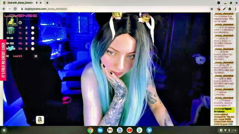 Teal-haired cosplay slut with cat ears teases topless on webcam