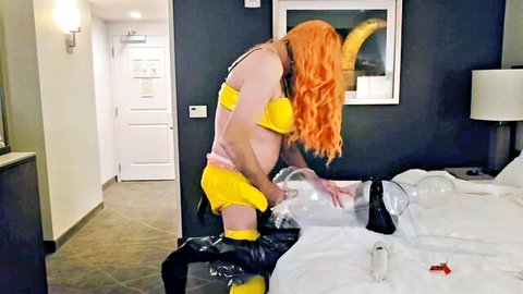 Sissy Diana in yellow lingerie bending over plastic doll fetish play