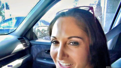 Ava Addams smiling selfie in car, wet windows, from EvilAngel Raw 12