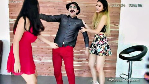 Two hot women in short dresses grab mustached man's arms in femdom domination tease