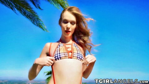 Crystal Thayer teases in open checkered bikini top on sunny beach