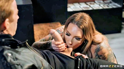 Ava Austen tattooed babe giving intense blowjob in Brazzers scene