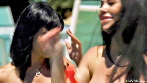 Inna Innaki and Alice Alisaki topless smiling poolside