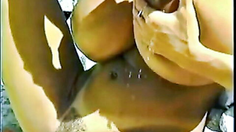 Tiffany Towers topless with massive wet breasts in solo scene
