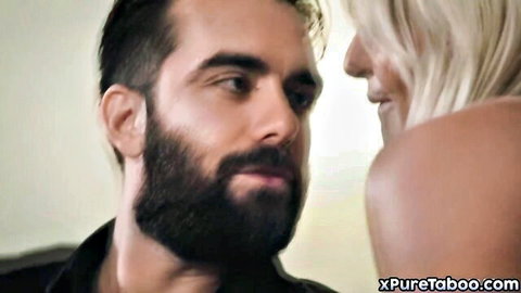 Bearded man gazes at smiling blonde in BDSM femdom tease