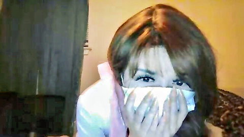 Fifi011112 Colombian cam girl shyly covering face in white top