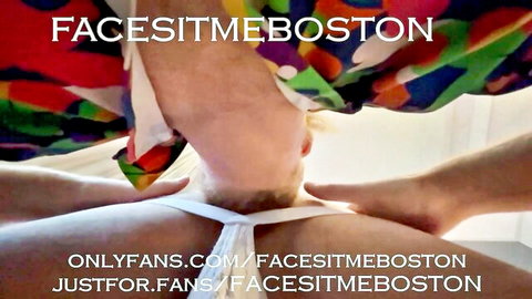 Blonde woman facesat by man, nuzzling his ass in humiliation fetish scene