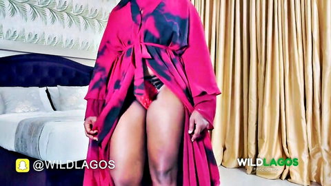 Aisha in open pink robe revealing black lingerie, WildLagos tease