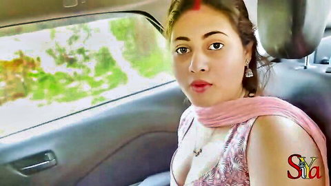 Siya Bhabhi in pink low-cut top showing cleavage in car, desi amateur Goa trip
