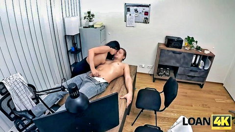 Brunette babe kissing neck of naked guy on office desk with hard cock exposed