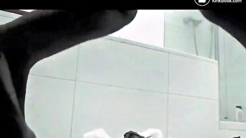 Woman in black stockings squatting to poop in bathroom, scat fetish solo
