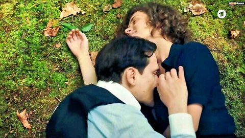 Liv Lisa Fries topless outdoor embrace and kiss in Kafka s01e05