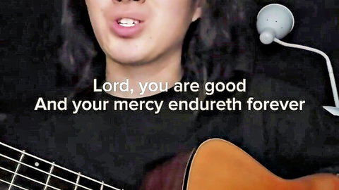 Passionate Asian singer moaning 'Oh My You Are So Good' with guitar vibe