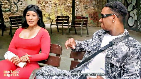Mariana Martix in red dress chats sultrily with Jesus Reyes outdoors