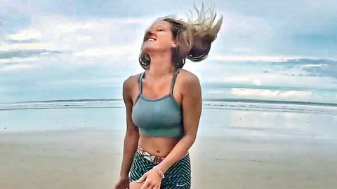SparksGoWild blonde smiling topless at beach in teal top and shorts