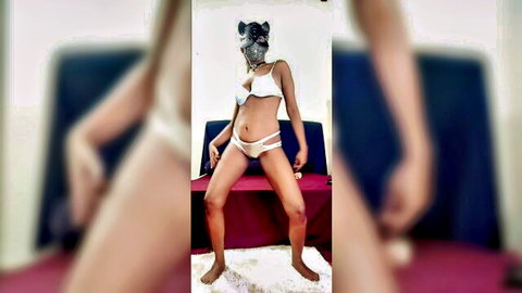 Ebony beauty in silver bikini and cat mask performs sexy solo dance