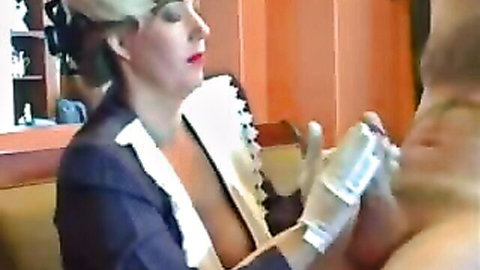 Gloved MILF in suit gives CFNM handjob, blonde mature woman with red lips