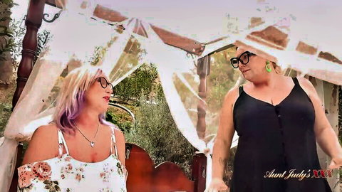 Mature lesbian couple in dresses outdoors, Aunt Judys style