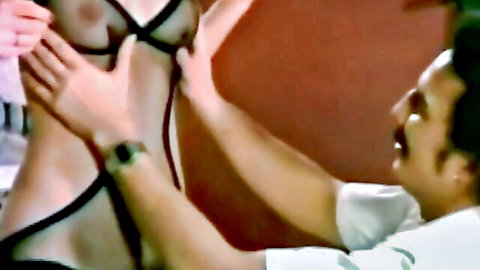 Vintage Danish porn: slim woman in sheer black lingerie fondled by Asian man