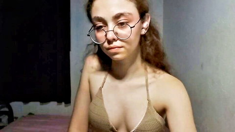 Babybunny1428 camgirl in sexy beige top showing cleavage and curves