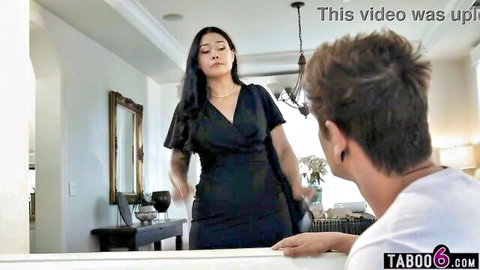 Dana Vespoli as bossy stepmom in black dress confronts lazy stepson