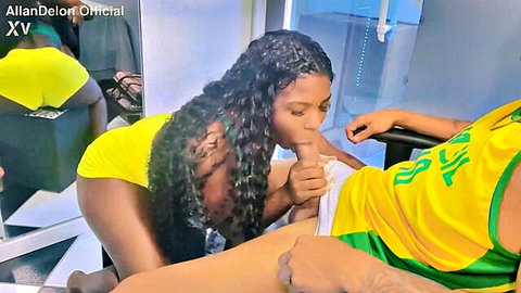 Holly Bombom, curvy black trans hottie giving intense blowjob to her man