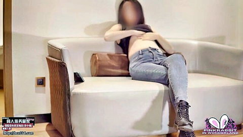 Taiwanese Pink Rabbit teases with exposed breasts, hands covering in jeans solo