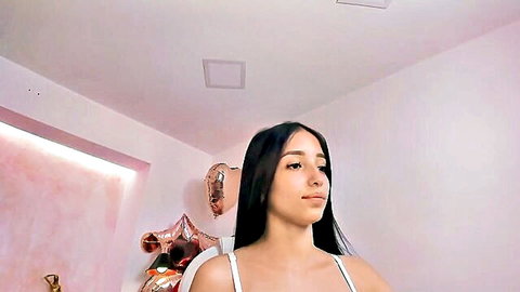 Sexy morena with long black hair in white camisole top